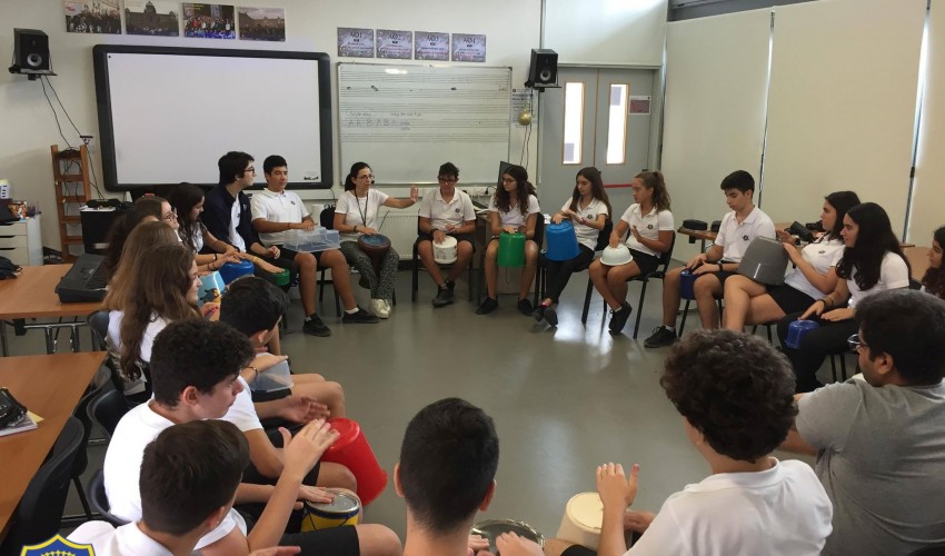 Students drumming circle 